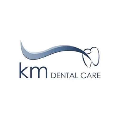 KM Dental Care Logo