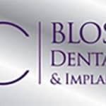 Blossom Dental Care & Implant Studio Logo
